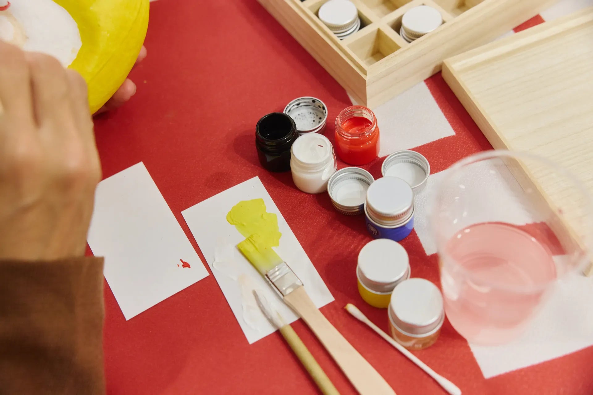 Completed Daruma dolls in vibrant colors